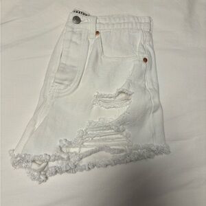 white ripped jean shorts from signature 8